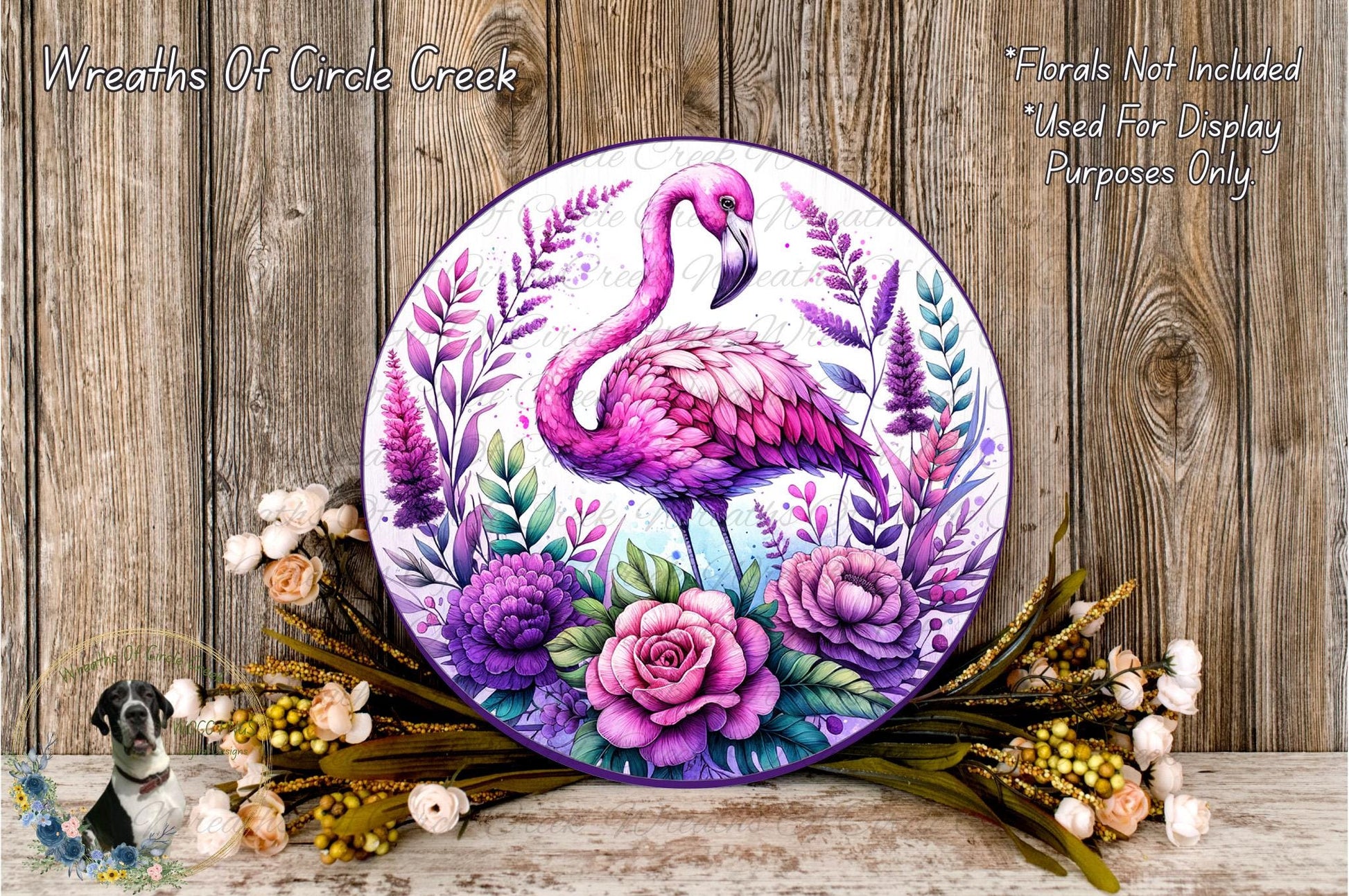 a picture of a pink flamingo with flowers on it