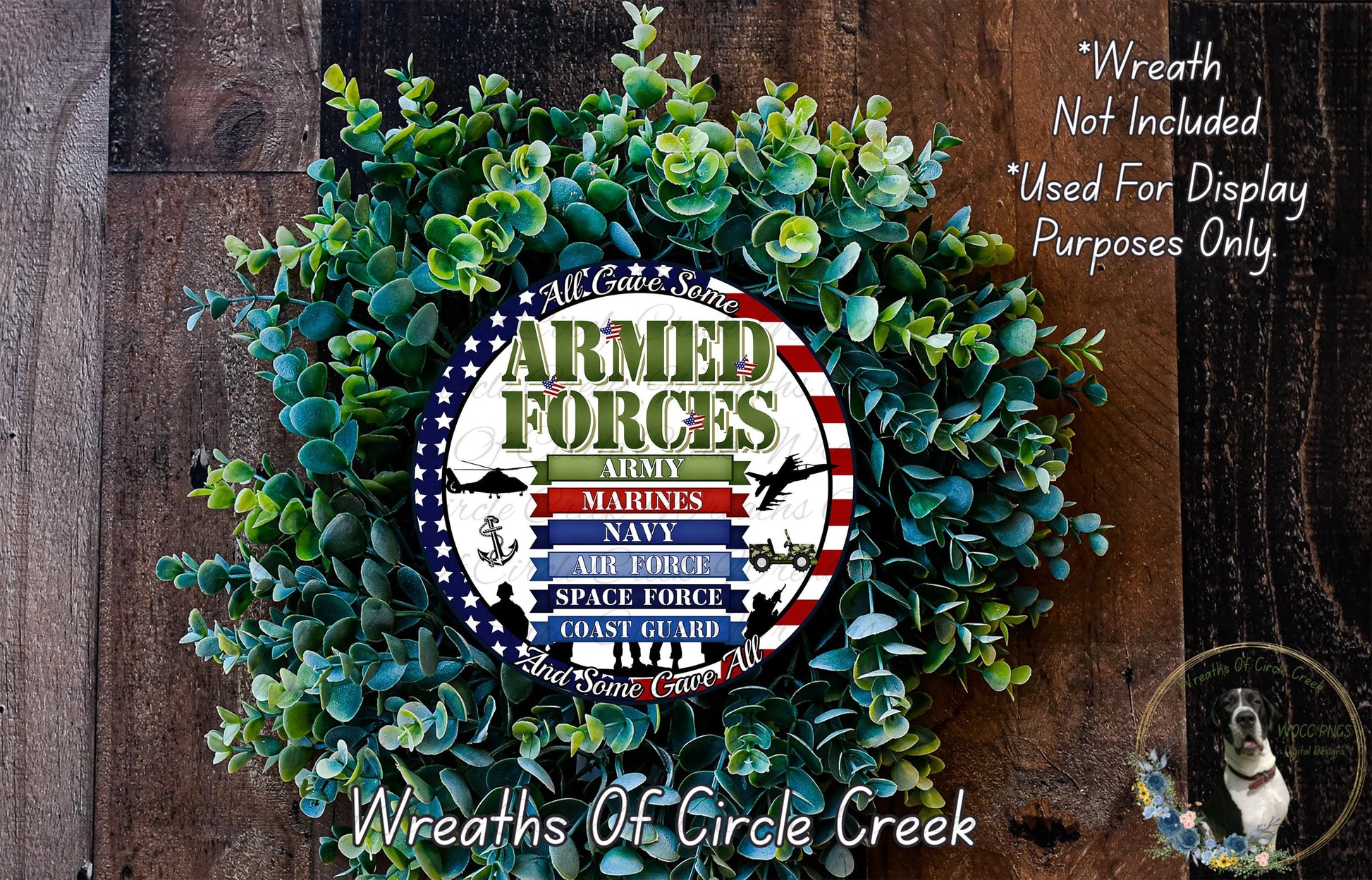 a wreath made of green foliage and a circular sign with the text "Armed Forces" and various military-related icons and text.
