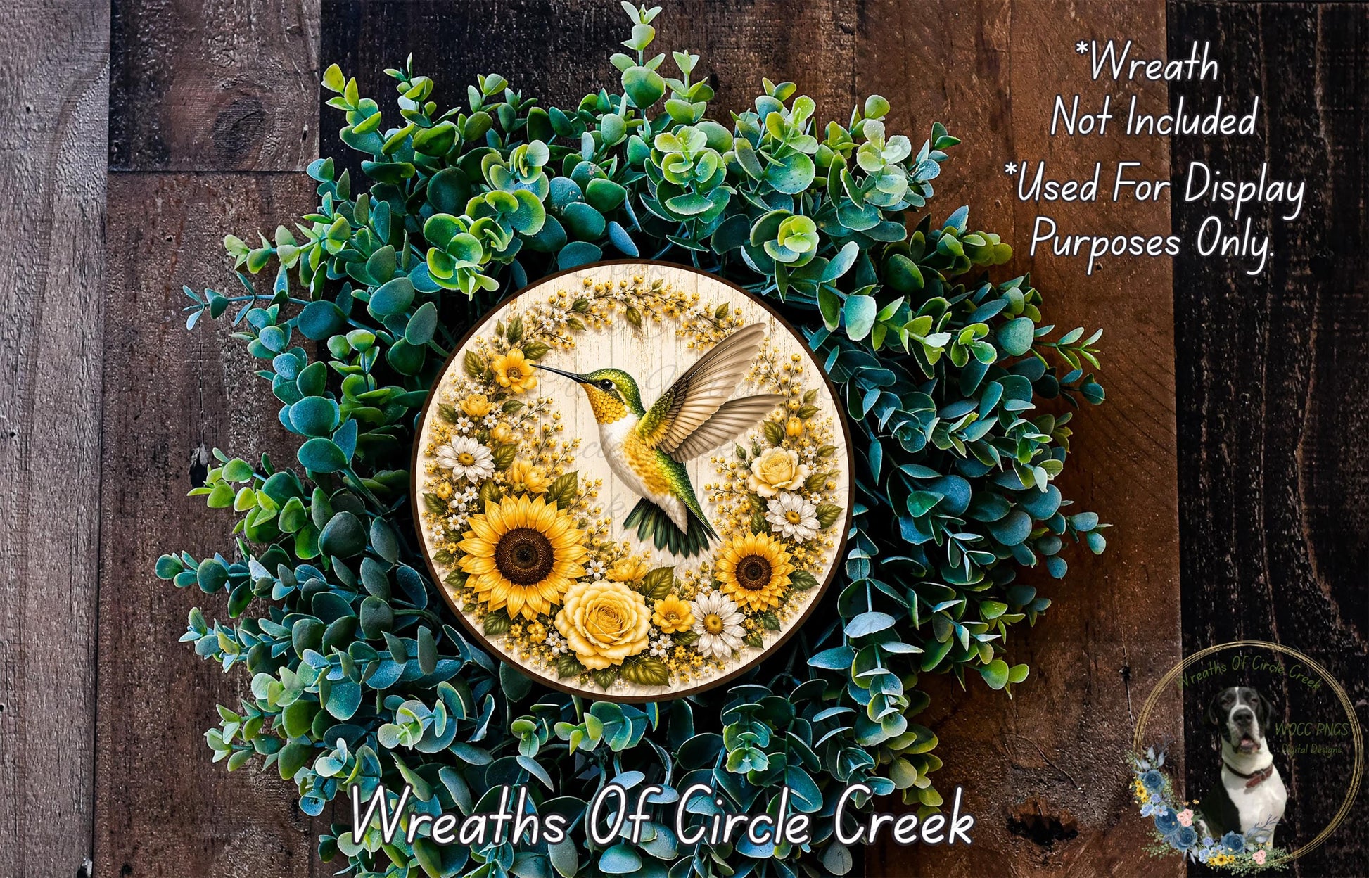 A wreath made of green leaves and yellow flowers, with a bird, specifically a hummingbird, depicted on the wreath.
