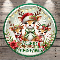 A festive Christmas-themed image featuring three adorable deer wearing Santa hats and scarves, surrounded by holiday decorations such as flowers and lights. The text "Merry Christmas!" is displayed in the center of the image.