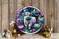 A Halloween-themed wreath featuring a large, furry animal surrounded by pumpkins, roses, and bats against a dark background.
