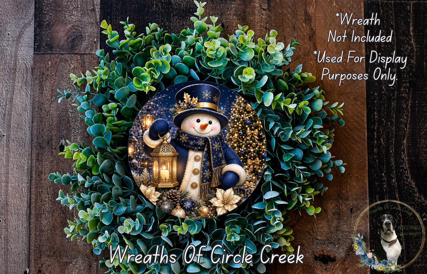 A wreath featuring a snowman holding a lantern, surrounded by greenery and flowers, with a text overlay that reads "Wreath Not Included * Used For Display Purposes Only" and "Wreaths of Circle Creek".
