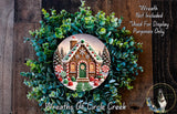 A wreath made of evergreen branches and a gingerbread house, with a caption that reads "Wreath Not Included * Used For Display Purposes Only".