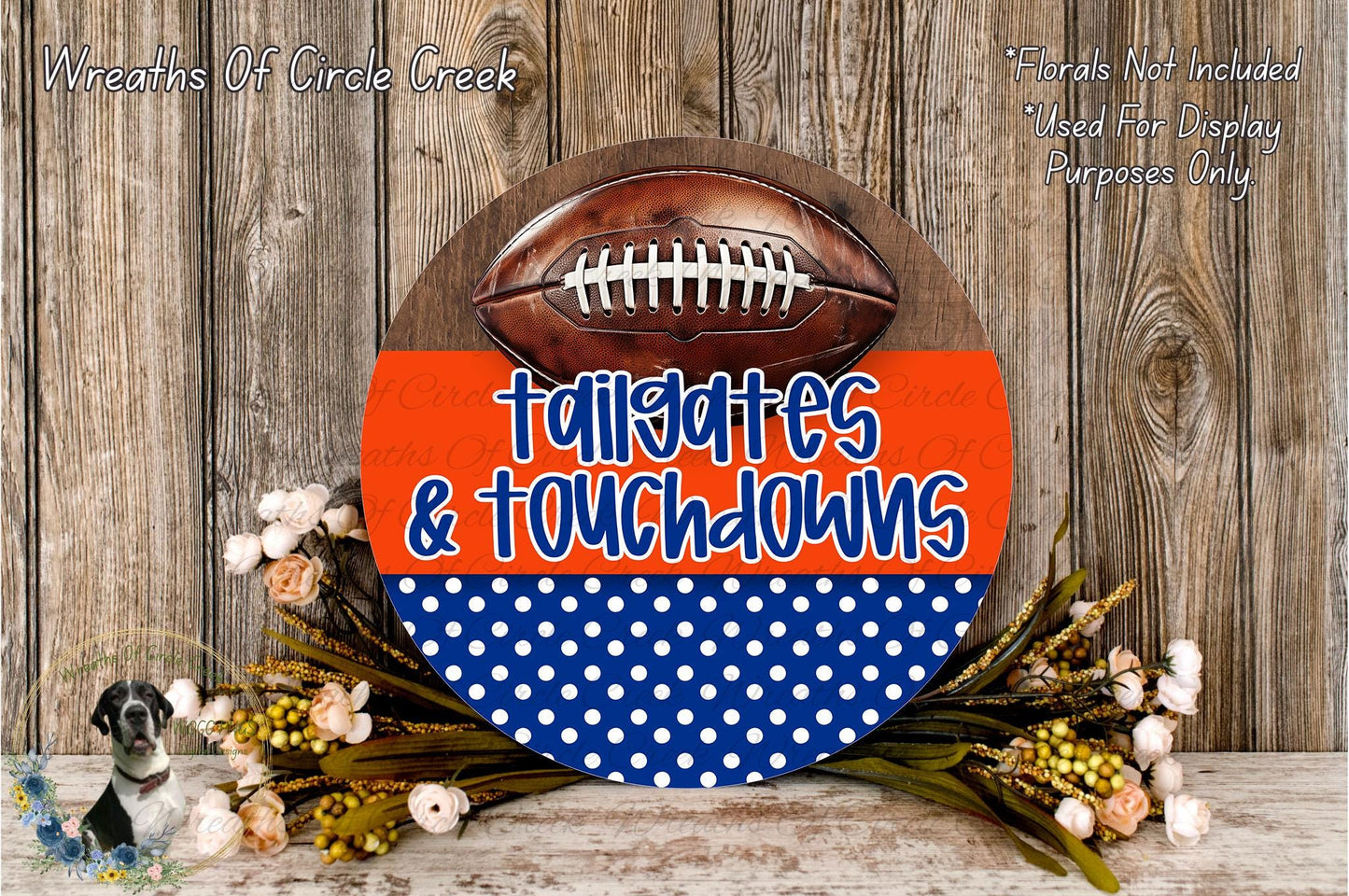 a decorative sign with a football and the words "tailgates & touchdowns" written on it, placed on a wooden surface. There are also some flowers and greenery surrounding the sign.