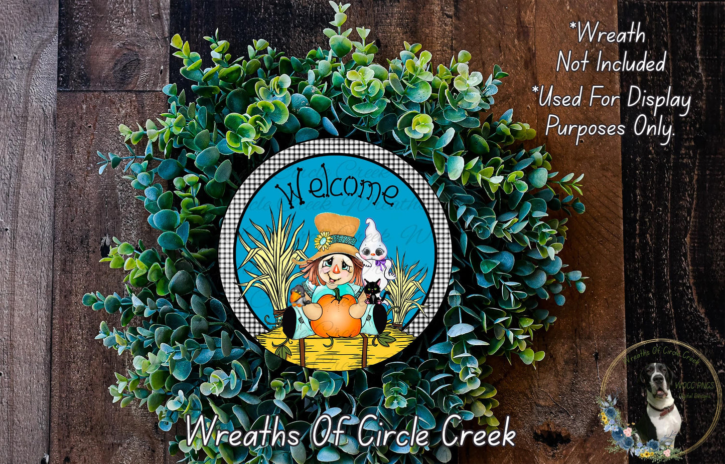 a wreath with a picture of a scarecrow on it