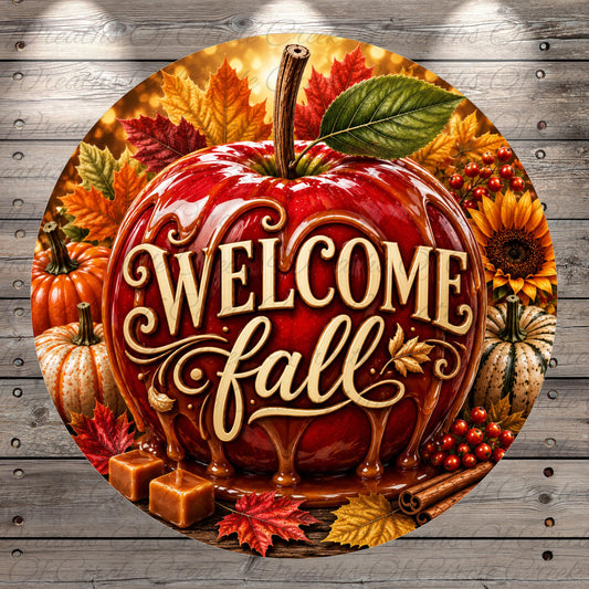 A large red apple with the text "WELCOME fall" written on it, surrounded by autumn leaves, pumpkins, sunflowers, and other fall-themed decorations.