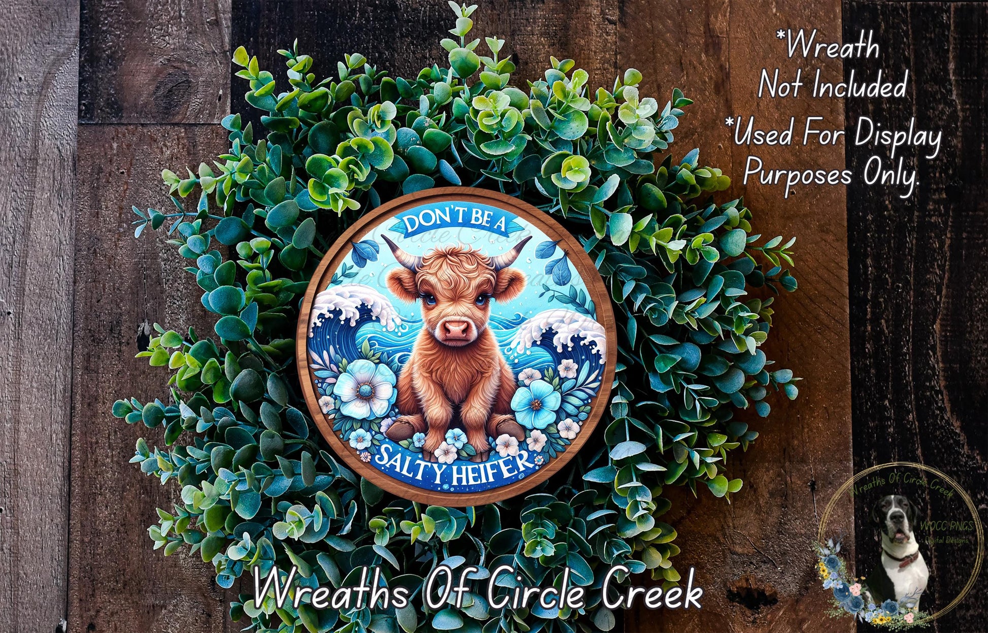 a wreath with a picture of a cow on it