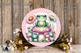 A whimsical illustration of a frog sitting on a mushroom, surrounded by flowers and mushrooms, with a wooden background.