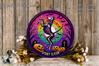 a picture of a skeleton dancing with pumpkins