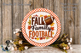 a decorative sign with the text "FALL Family FOOTBALL" surrounded by autumn leaves and flowers, placed on a wooden surface.
