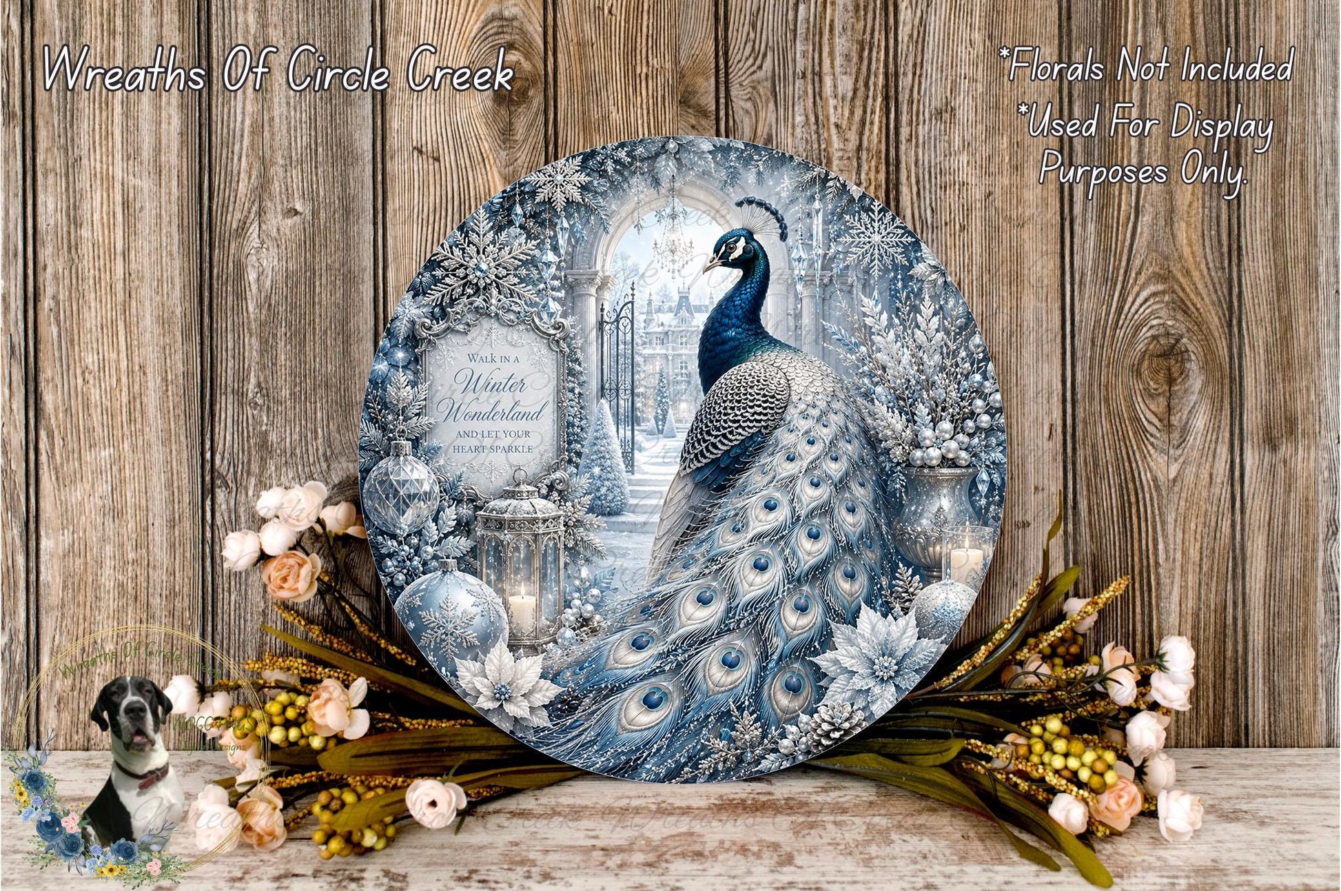 A decorative plate featuring a peacock surrounded by a winter wonderland scene, with a snowy landscape, trees, and flowers.