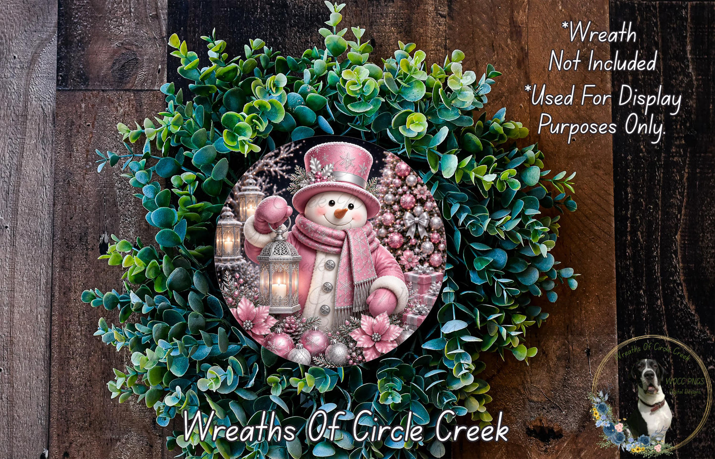 A wreath featuring a snowman surrounded by greenery and flowers, with a lantern in its hand.