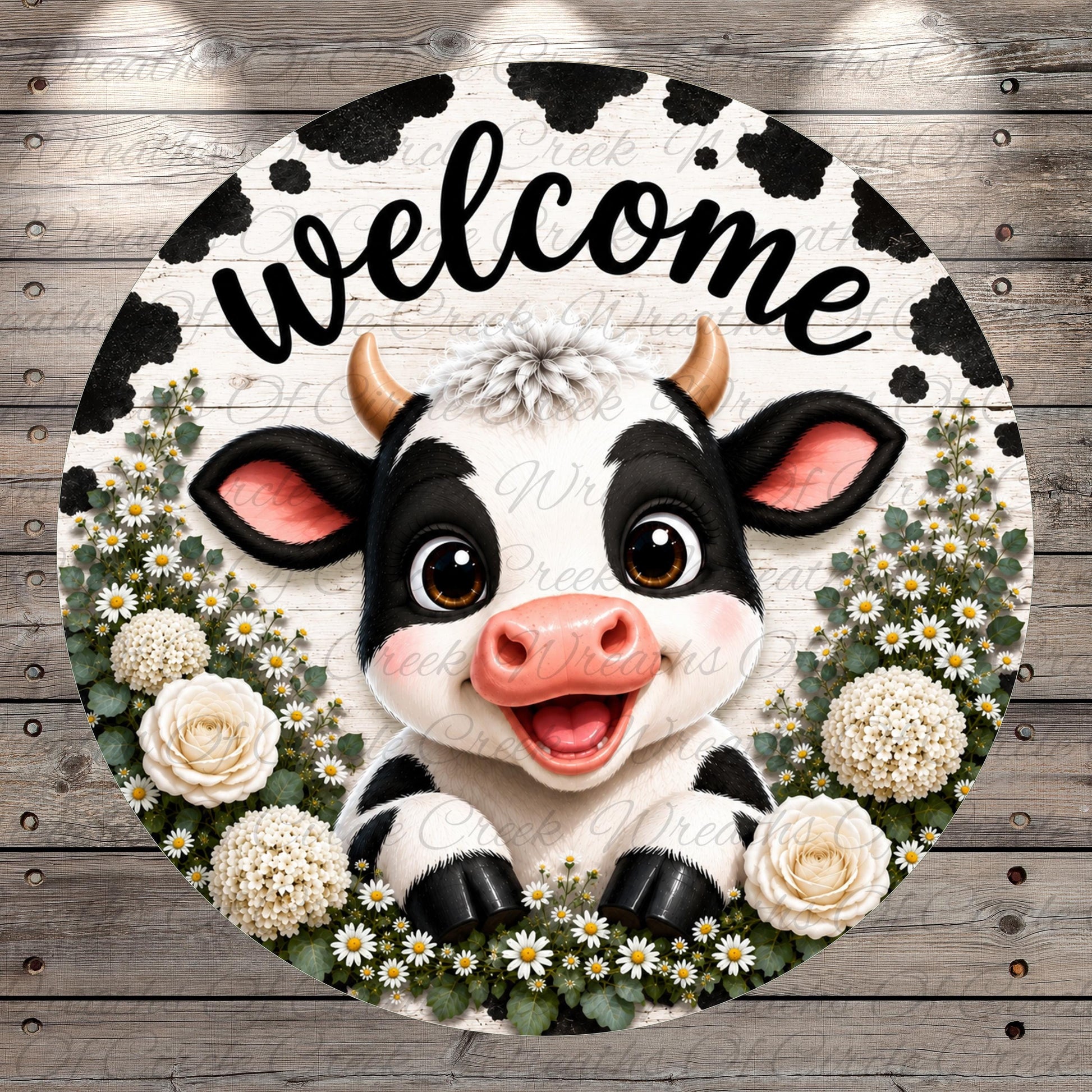 A black and white cow with horns is surrounded by white flowers and greenery, with the word "welcome" written above it.