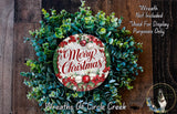 A Christmas wreath made of evergreen branches and greenery, with a circular sign that says &quot;Merry Christmas&quot; in the center.