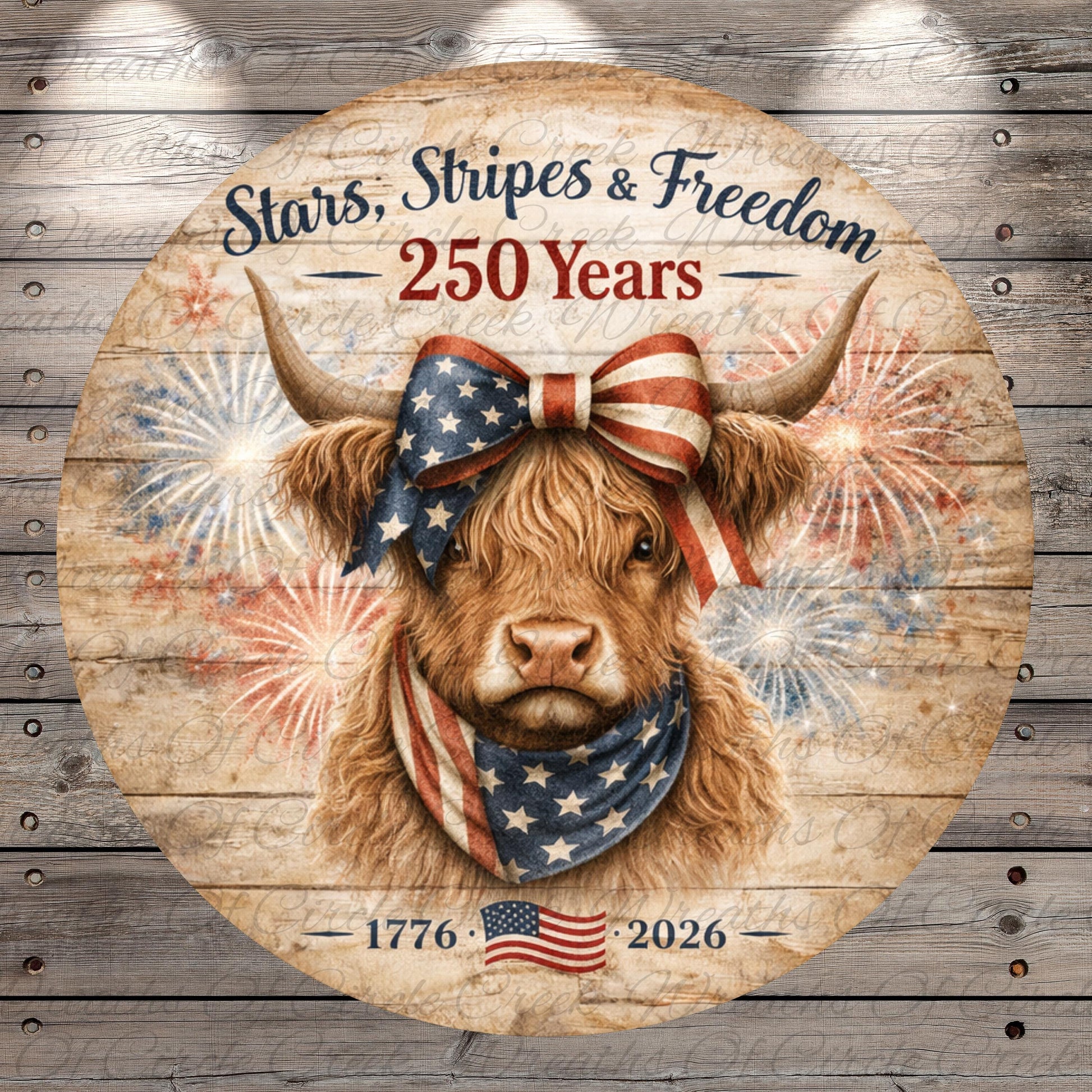 a large, brown cow wearing a patriotic American flag scarf and a patriotic ribbon, with fireworks in the background.