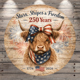 a large, brown cow wearing a patriotic American flag scarf and a patriotic ribbon, with fireworks in the background.