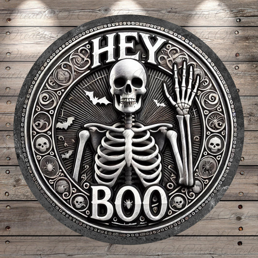 a clock with a skeleton on it that says hey boo