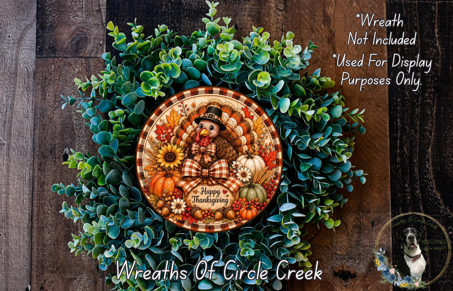 A wreath made of green leaves and a turkey, with a circular plate in the center displaying a Thanksgiving theme.