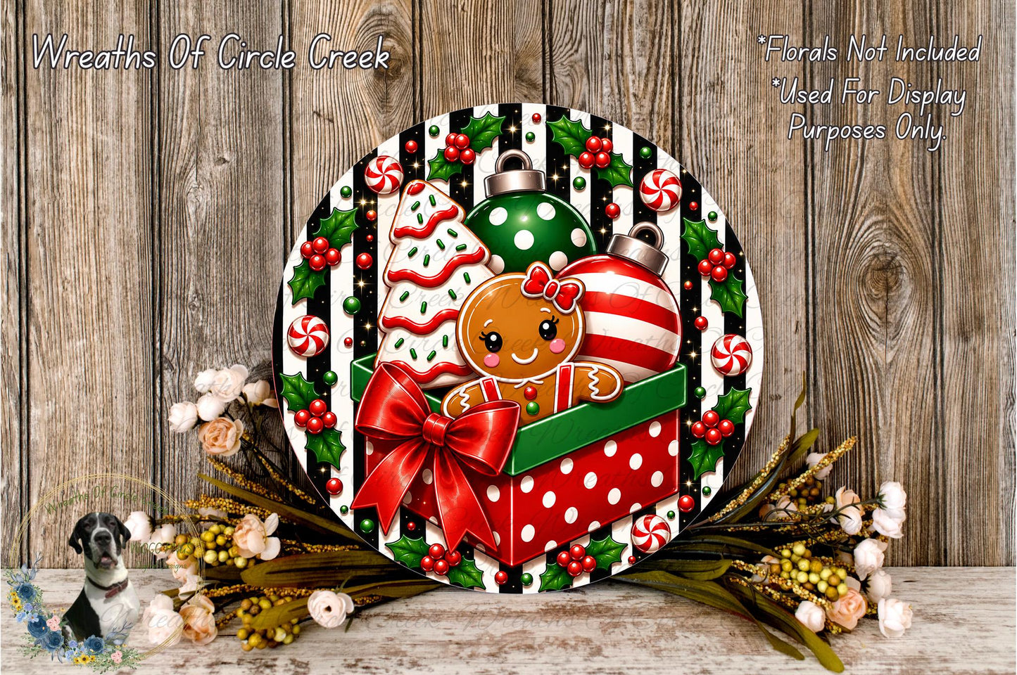 A festive wreath with a gingerbread man, Christmas ornaments, and a bow, set against a wooden background with a floral arrangement.