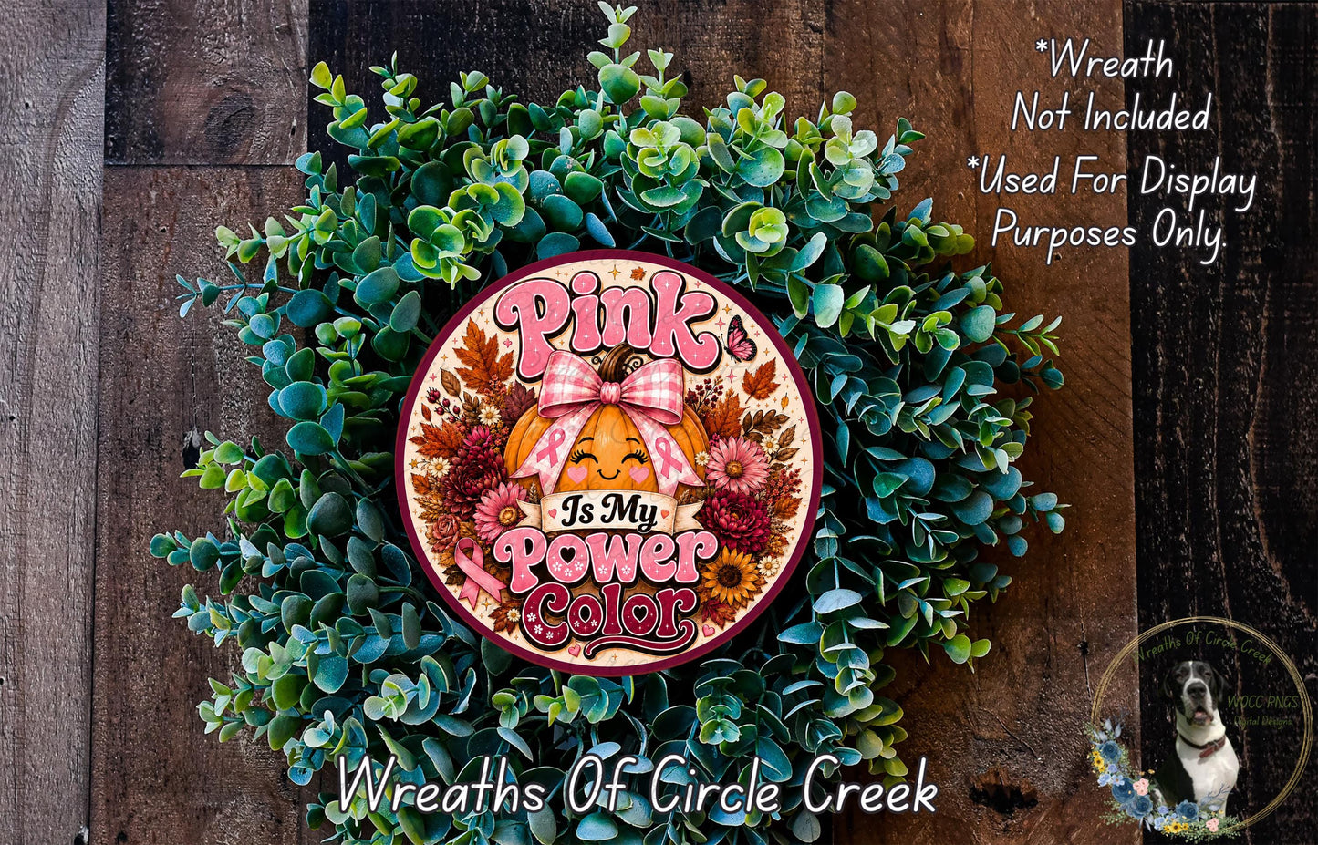 a wreath made of green leaves and flowers, with a central circular design that says "Is My Power Color" in pink and orange text.