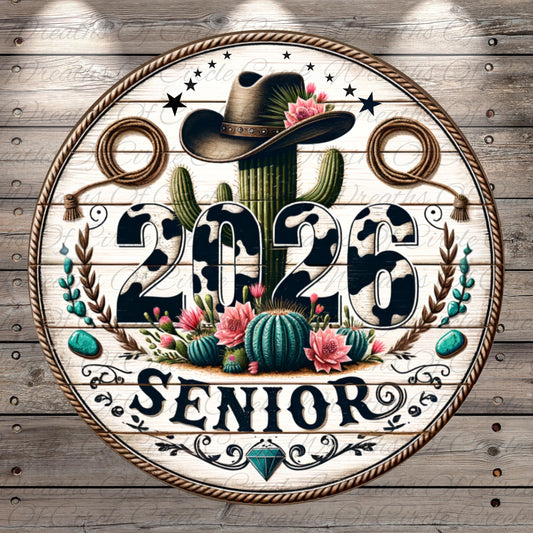 A circular sign with a cowboy hat, cactus, and floral elements, along with the text "2026 SENIOR" in a decorative font.