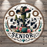 A circular sign with a cowboy hat, cactus, and floral elements, along with the text "2026 SENIOR" in a decorative font.