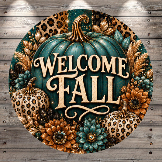 A round sign with a welcome message for fall, surrounded by autumn-themed elements such as pumpkins, flowers, and leopard print.