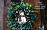 A wreath made of green foliage and a snowman, with a text overlay that reads "Wreath Not Included * Used For Display Purposes Only" and "Wreaths of Circle Creek".