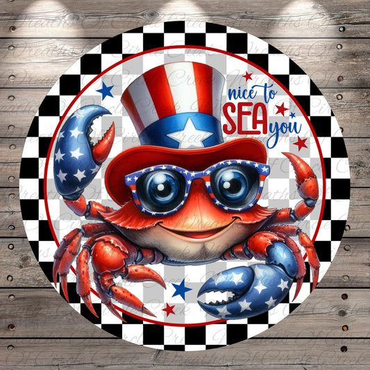 A crab wearing a patriotic hat and sunglasses, with a cheerful expression, is surrounded by stars and a checkered border.