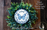 a wreath made of green leaves and a blue butterfly, with the text "Welcome" and "Wreaths of Circle Creek" displayed on it.