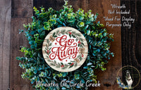 A wreath made of green and blue foliage, with a circular sign that says "Go Away" in red and white text.