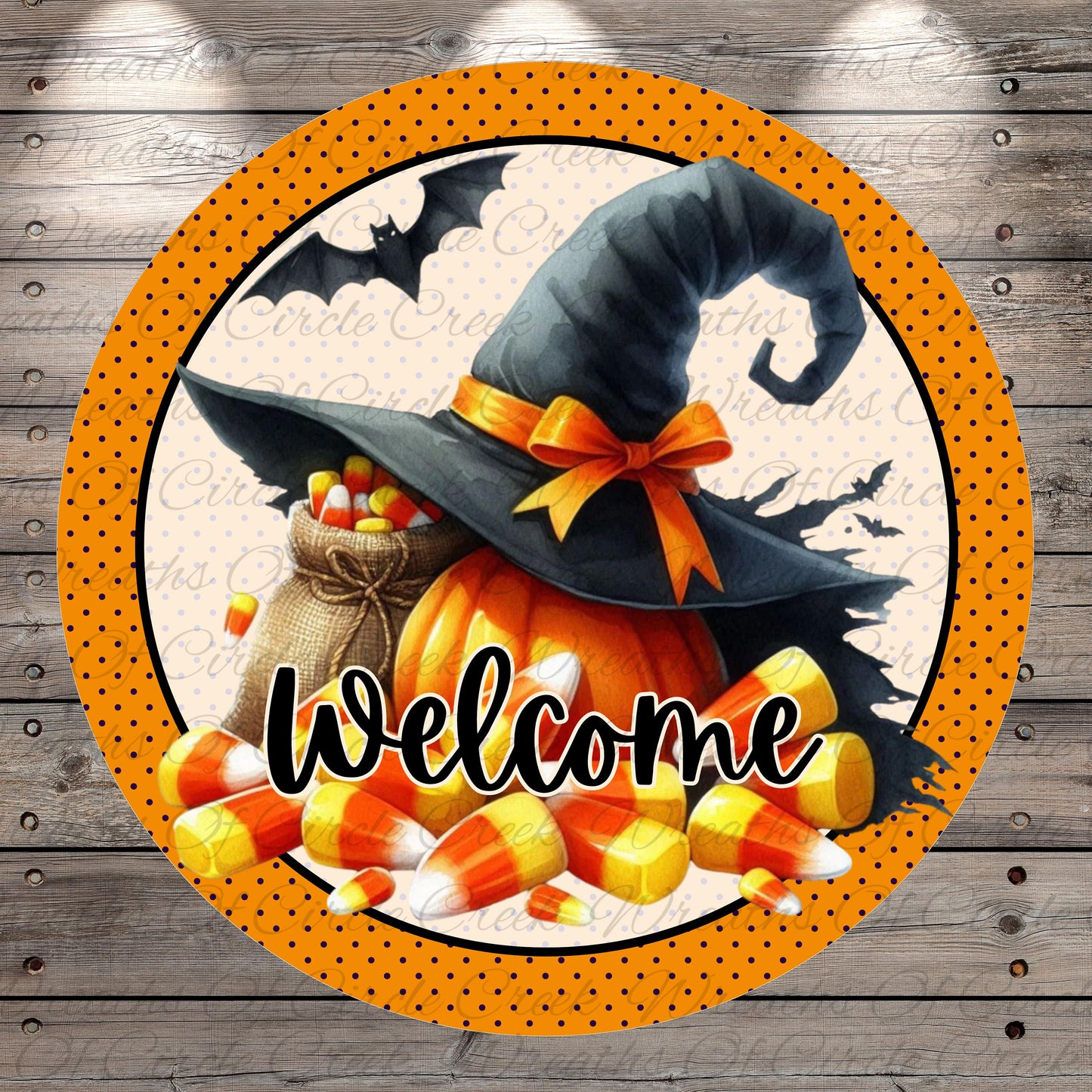 A round sign with a witch's hat, a pumpkin, and candy corn, along with the word "Welcome" written on it.
