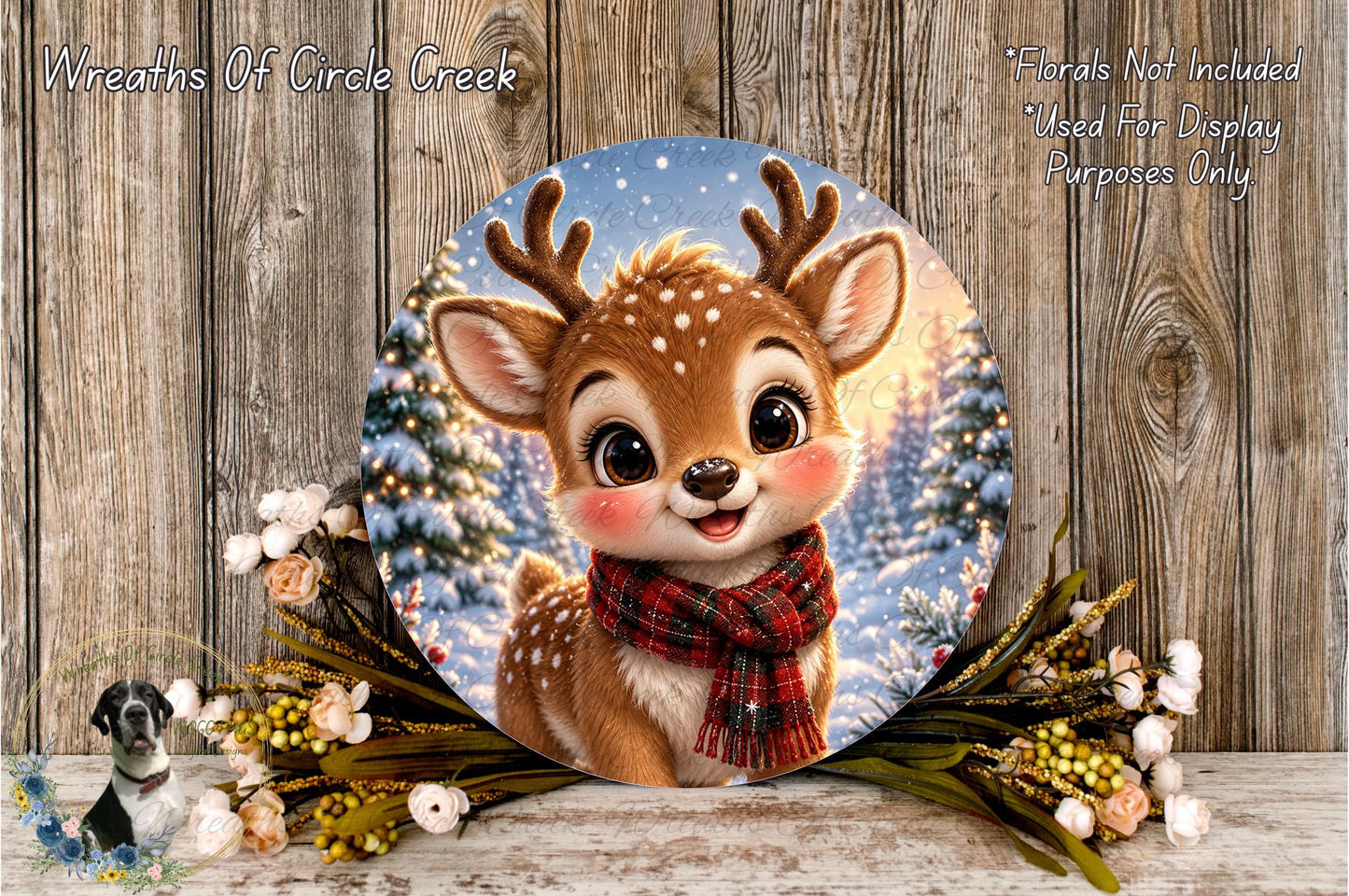 A round, decorative plate featuring a smiling deer with antlers, surrounded by a floral arrangement and a snowy winter scene.