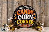 a decorative sign that reads "Welcome to Candy Corn Corner" with a floral arrangement of flowers and candy canes surrounding it.