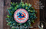 A wreath made of green leaves and a circular patriotic design featuring a firefighter silhouette and the text "We don't know them all but we owed them all".