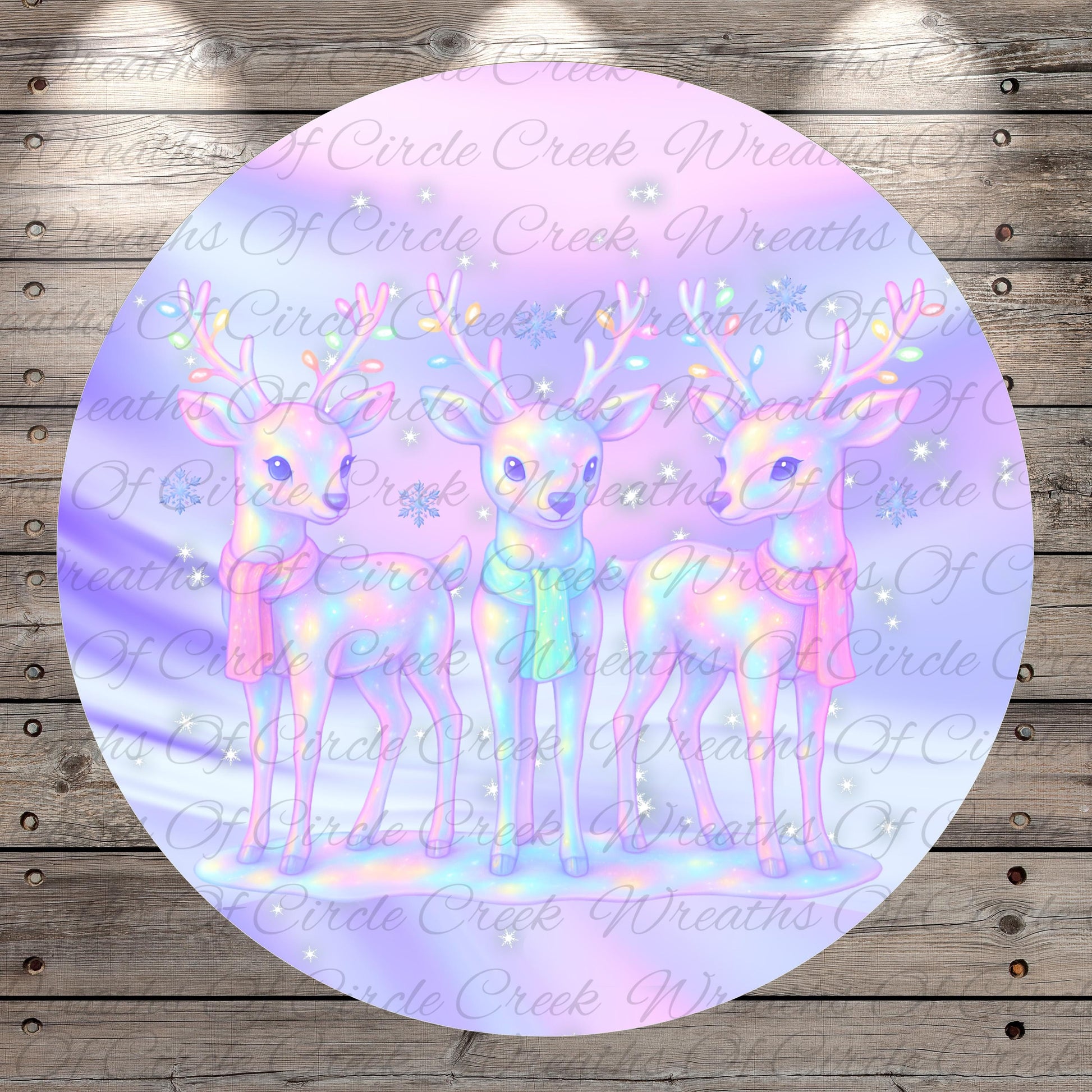 A circular image featuring three deer with antlers, set against a background of a purple and pink color scheme with stars.