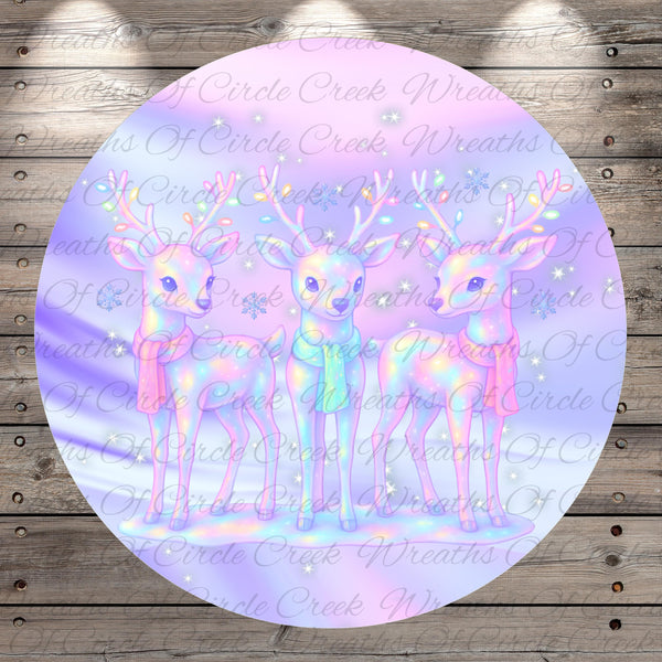 A circular image featuring three deer with antlers, set against a background of a purple and pink color scheme with stars.