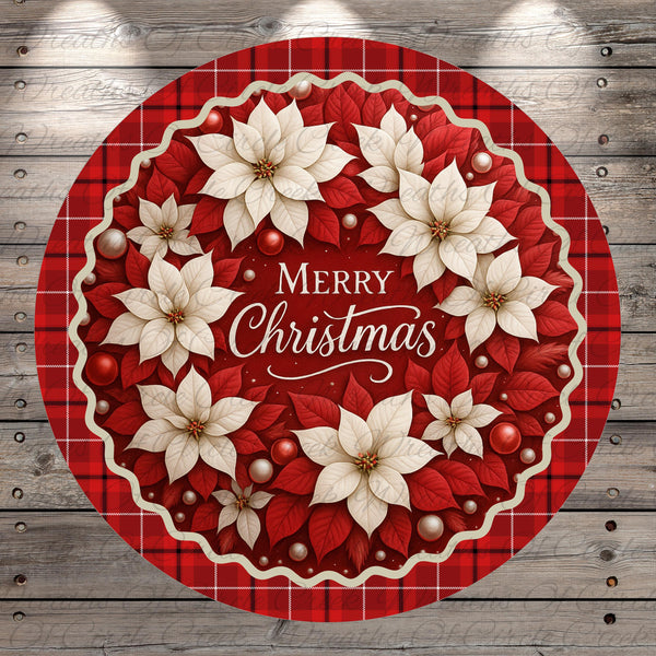 A festive Christmas wreath with white poinsettia flowers and red berries, surrounded by a red and white checkered border. The wreath is set against a wooden background with a red and white checkered pattern.