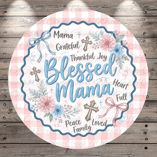 A round, decorative graphic with the text "Blessed Mama" surrounded by floral elements and crosses.