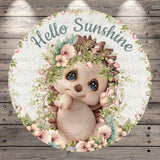 a picture of a baby hedge surrounded by flowers