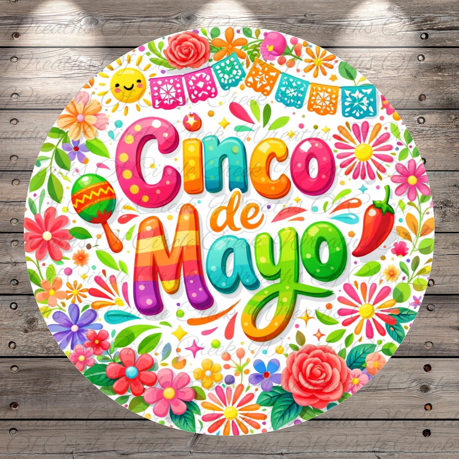 The image is a vibrant and colorful illustration featuring the text "Cinco de Mayo" surrounded by various festive elements such as flowers, banners, and a mariachi band.