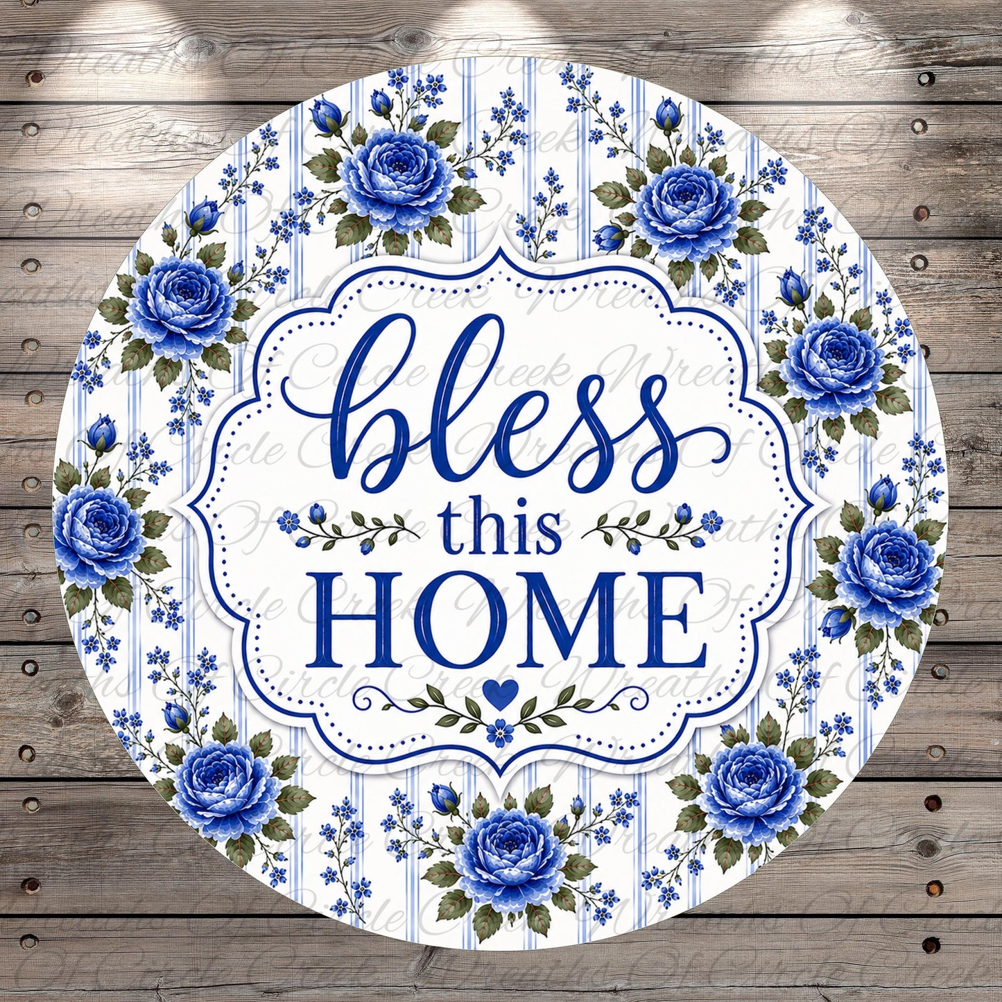 A round sign with a floral border and the text "bless this home" in blue and white.