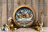 A round wooden plaque with a winter village scene and the text "Merry Christmas" is displayed against a wooden background.