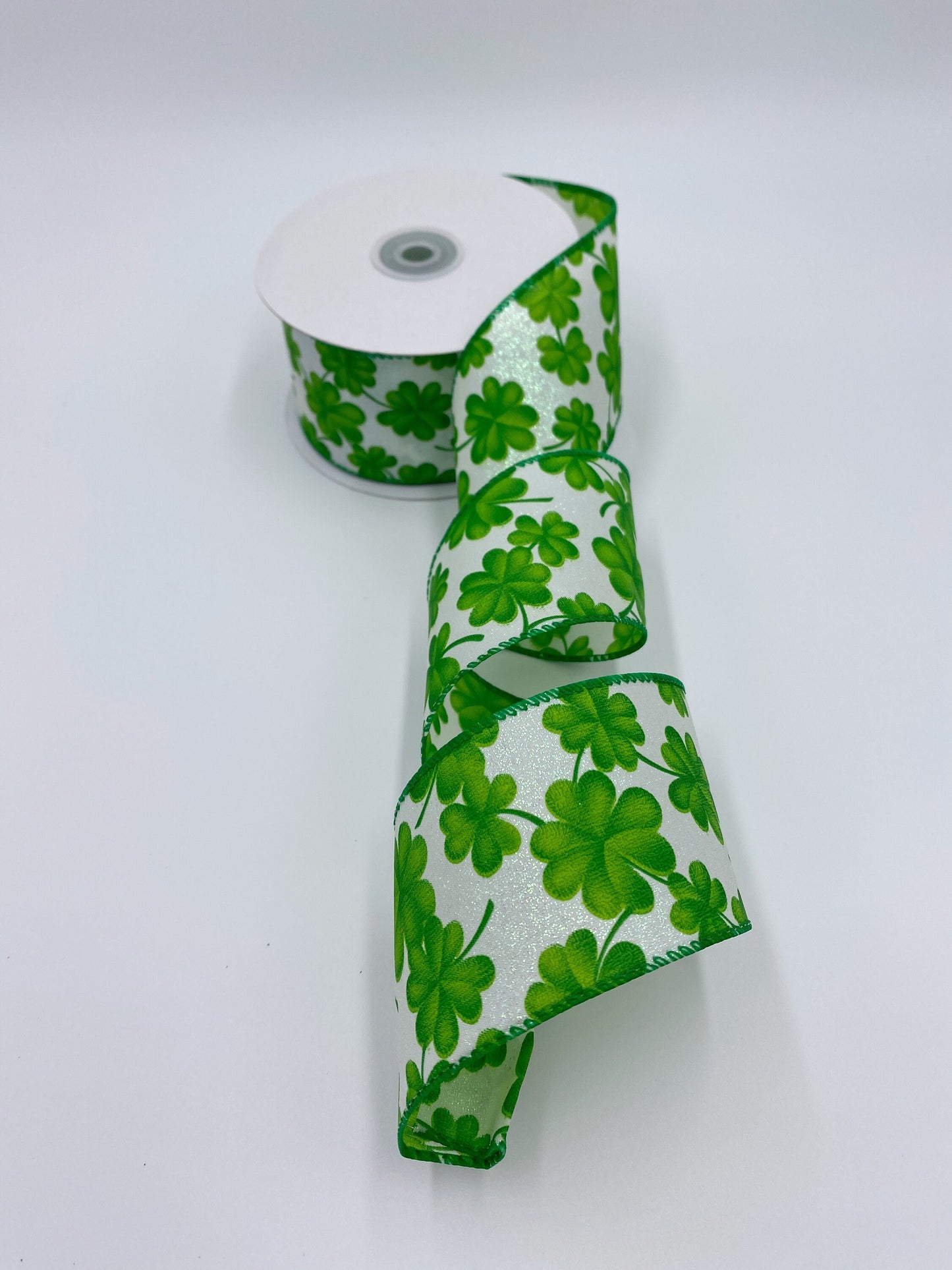 St. Patrick's Clover Ribbon, Iridescent Glitter On White, Green Clovers, Wired Edges, 2.5" X 20 YD.
